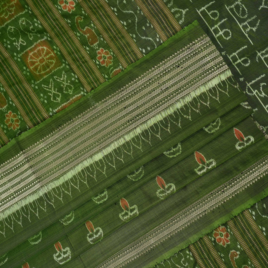 Ultra close-up of green Sambalpuri silk fabric, revealing its unique texture and fine weave.