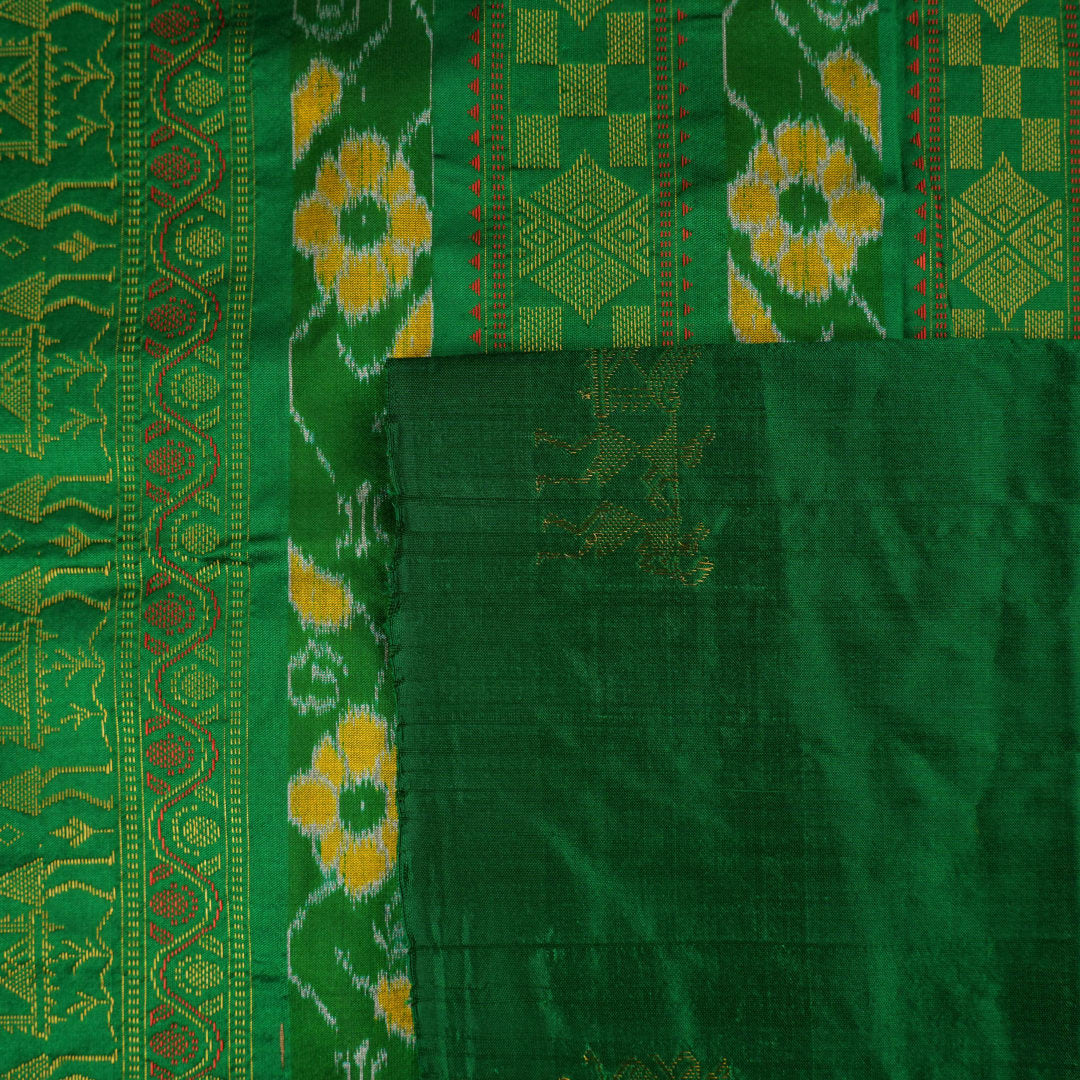 Extreme close-up of yellow Bomkai Silk Saree fabric, revealing the rich silk texture and weave.