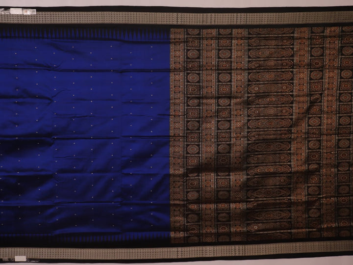 Close-up of the intricate woven texture of blue and black Bomkai silk saree with butta.