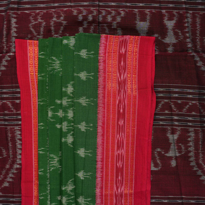 Model draped in a green and red Sambalpuri cotton saree with traditional motifs, styled for a classic look.