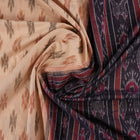 Full styling of a cream and black Sambalpuri cotton saree with traditional motifs on a model.