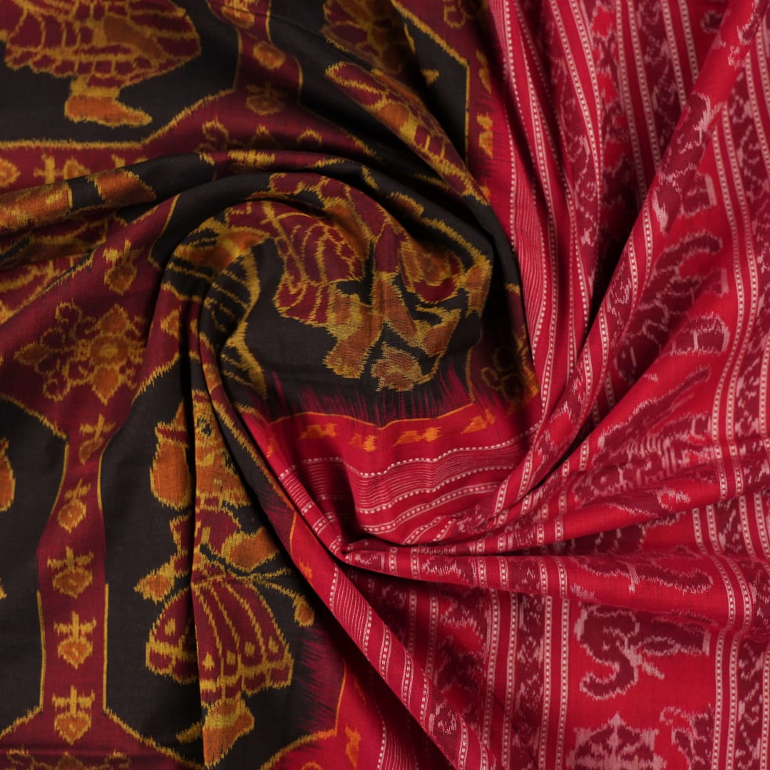Full layout of the black and red Sambalpuri cotton saree showcasing the complete body pattern and pallu.