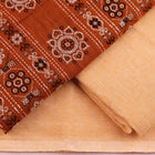 Matching blouse piece detail for the rust and cream Bomkai Cotton Dress Material, showcasing complementary weave.