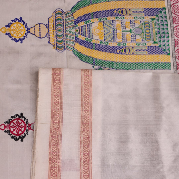 Close-up texture of black and white Bomkai silk saree with butta pattern.