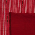 Entire white and maroon striped Sambalpuri cotton saree laid out.