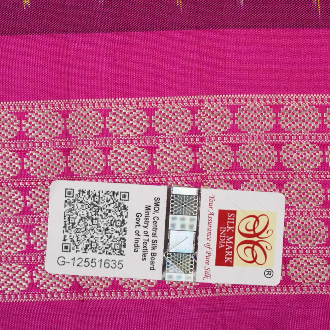 Extreme close-up of Bomkai Silk Saree fabric, highlighting its luxurious texture and handloom weave.