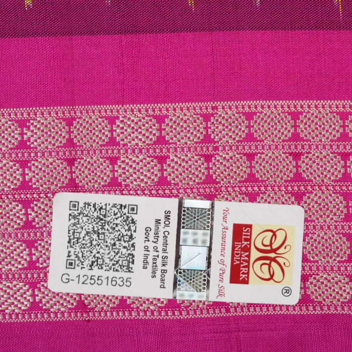 Extreme close-up of Bomkai Silk Saree fabric, highlighting its luxurious texture and handloom weave.