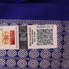 Close-up showcasing the silk texture of a blue and blue Bomkai silk saree with a butta pattern.