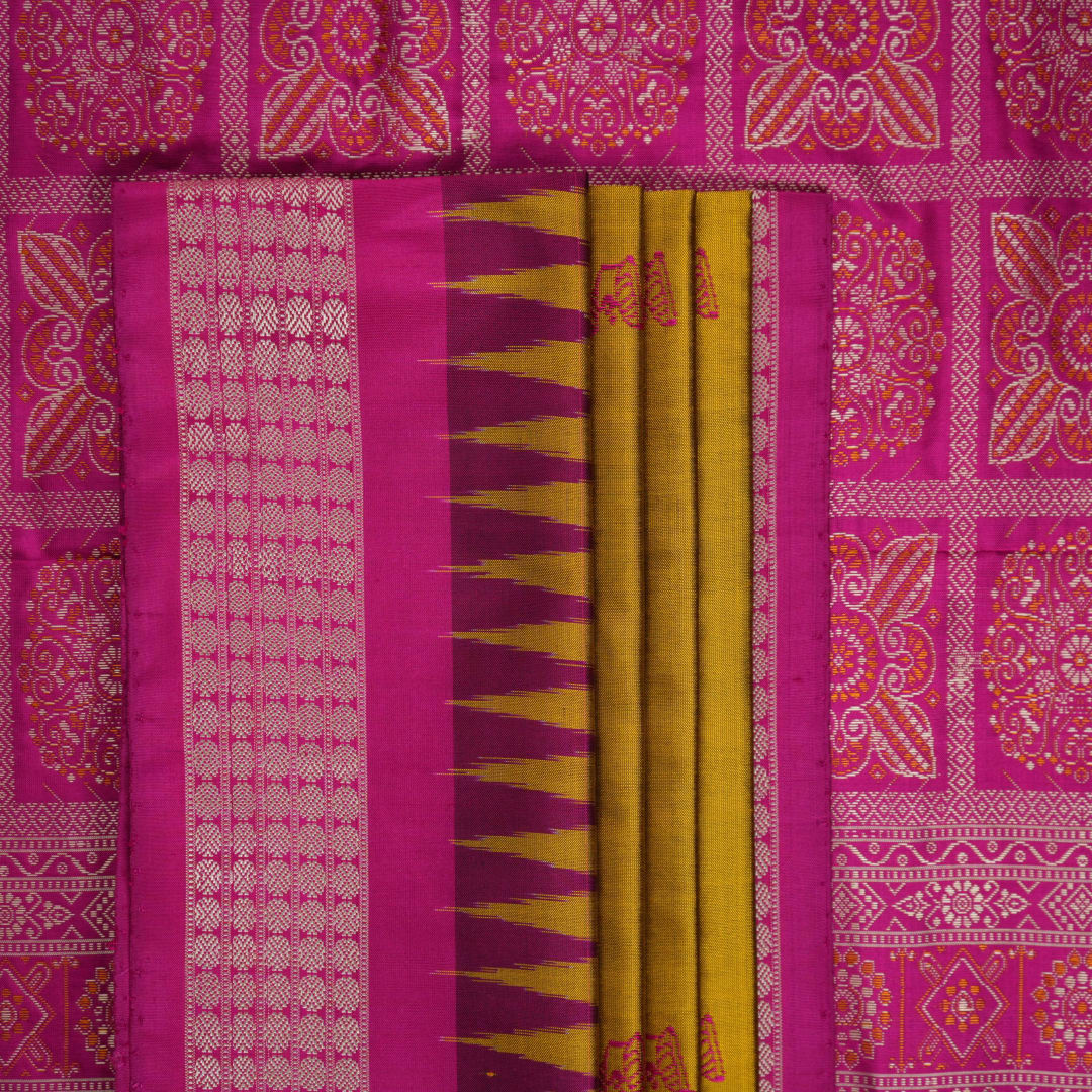 Extreme close-up of Bomkai Silk Saree fabric, highlighting its luxurious texture and handloom weave.