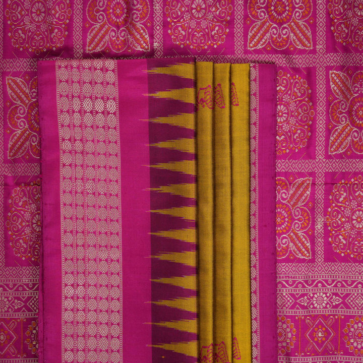 Extreme close-up of Bomkai Silk Saree fabric, highlighting its luxurious texture and handloom weave.
