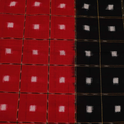 Red and black Sambalpuri cotton dupatta with intricate motifs, styled elegantly