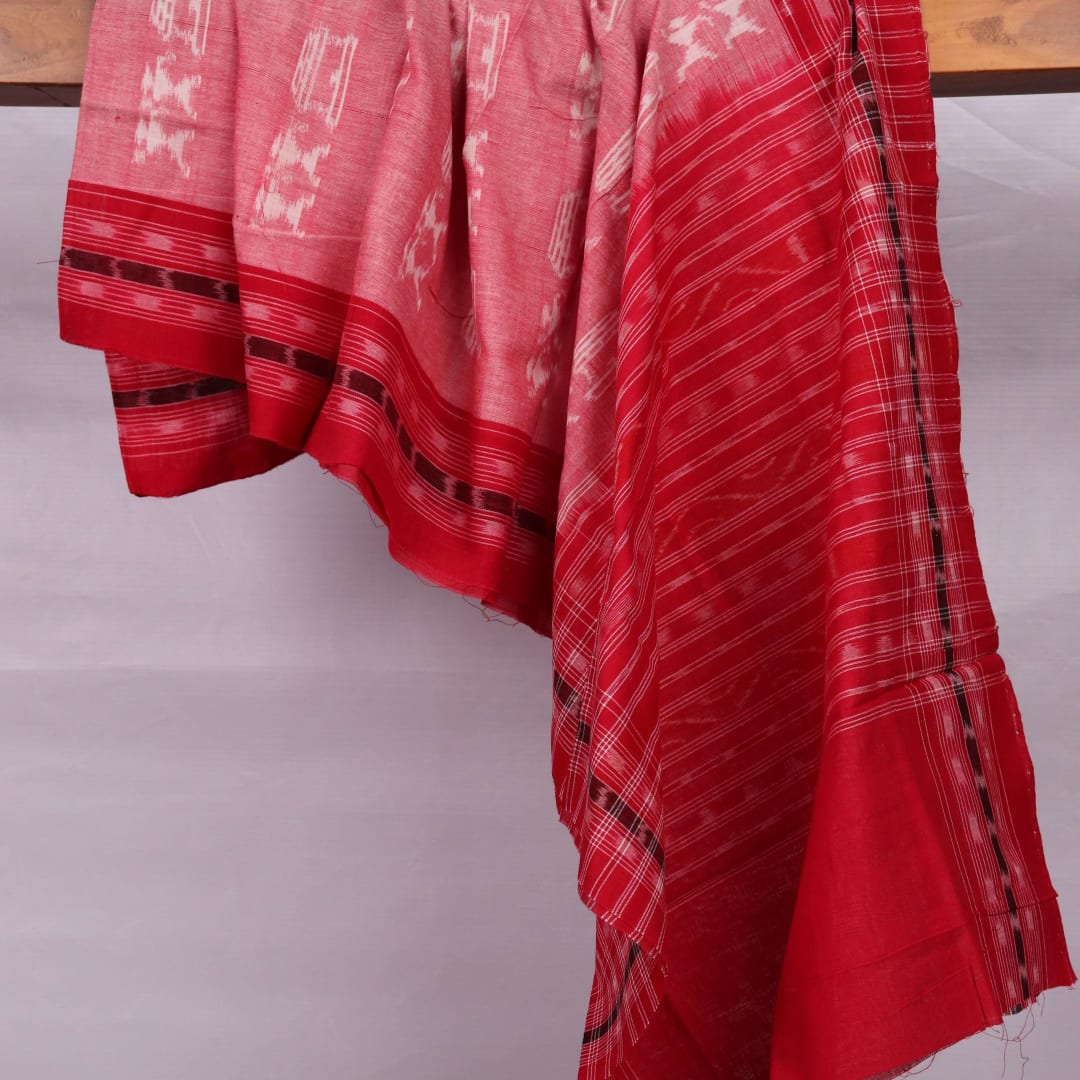 Off-white Sambalpuri cotton dupatta with intricate motifs, styled for a captivating look.