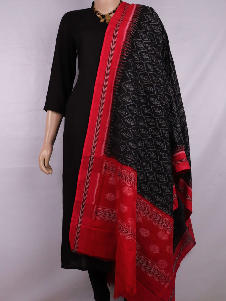 Stylishly draped Black Sambalpuri Dupatta in cotton with Red motifs