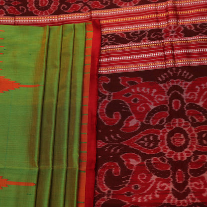 Close-up of plain green Sambalpuri silk saree fabric texture.