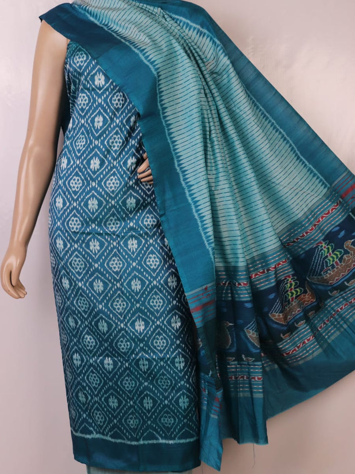 Detail of blue Sambalpuri silk dress material blouse piece with motifs.