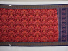 Full flat layout of maroon and blue Sambalpuri cotton saree with traditional motifs and ikat border.