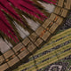 Magenta Khandua silk saree styled; green blouse accentuates the butta pattern and rich drape.