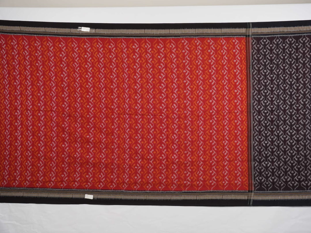 Model draped in a maroon and black Sambalpuri cotton saree showcasing elegant traditional handloom style