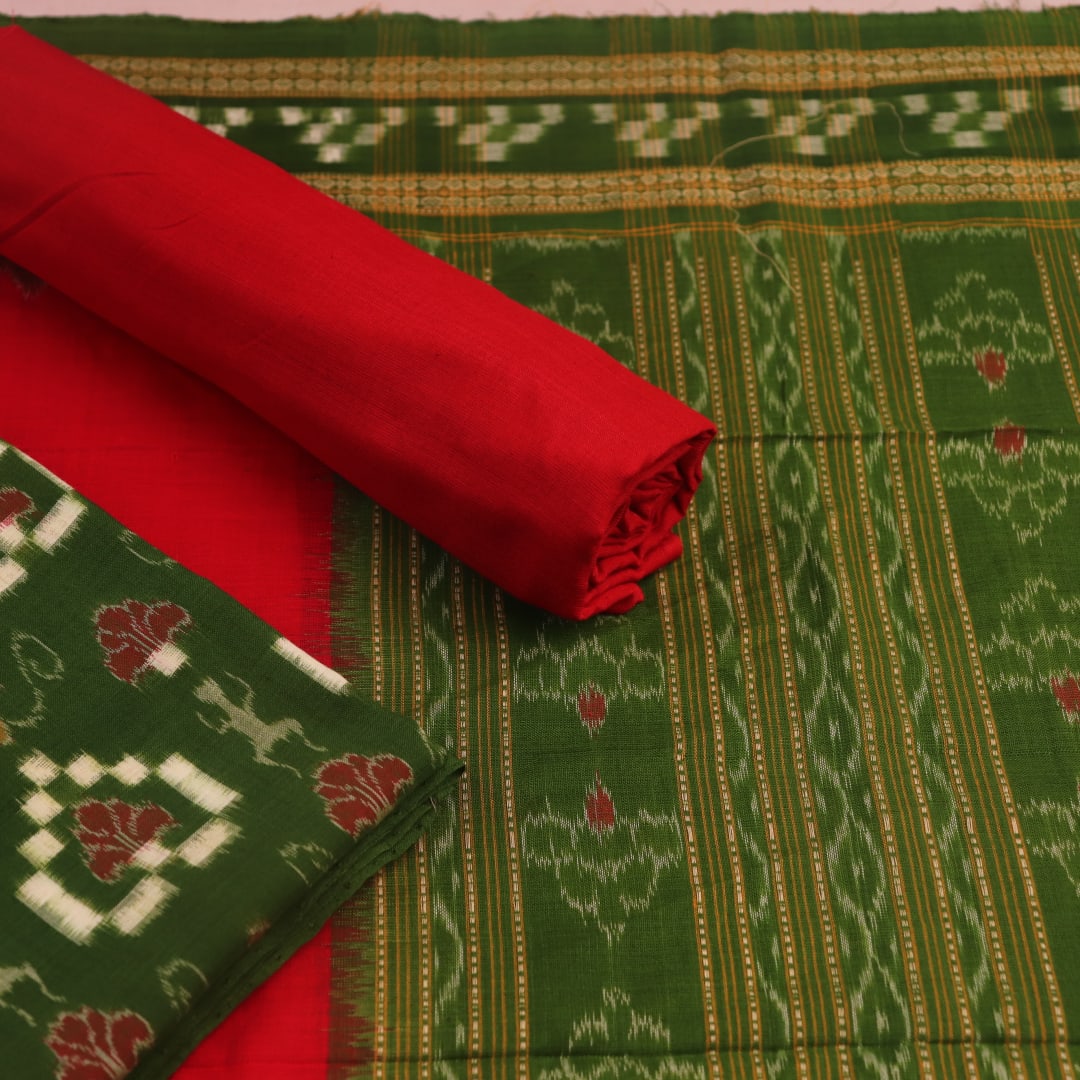 Detailed view of the Sambalpuri green and red cotton dress material's Pasapalli pattern blouse piece.