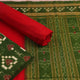 Detailed view of the Sambalpuri green and red cotton dress material's Pasapalli pattern blouse piece.