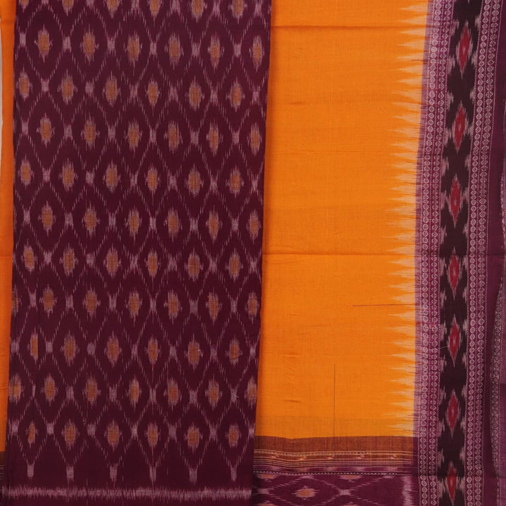 Close-up of purple and yellow motifs on Sambalpuri cotton dress material body.
