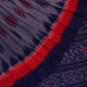 Blue Sambalpuri cotton saree with motifs, gracefully draped.