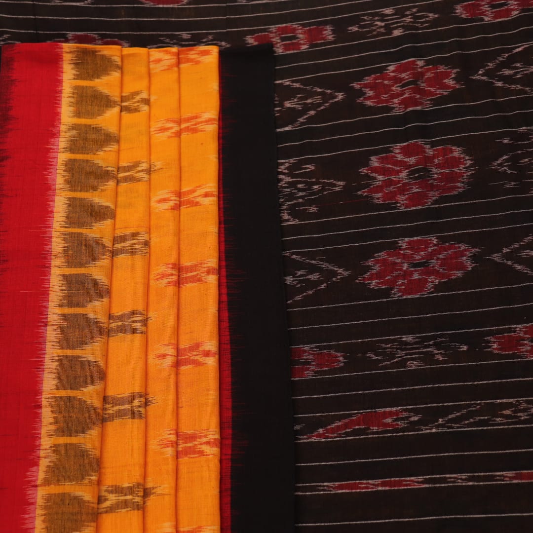 Styling shot showcasing a draped yellow and black Sambalpuri cotton saree with motif details.