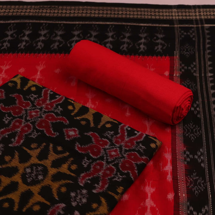 Detailed view of the red and black motifs on the cotton Sambalpuri dress material (Image 4 of 7)