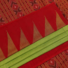 Full view of a plain green and red handloom Sambalpuri cotton saree.