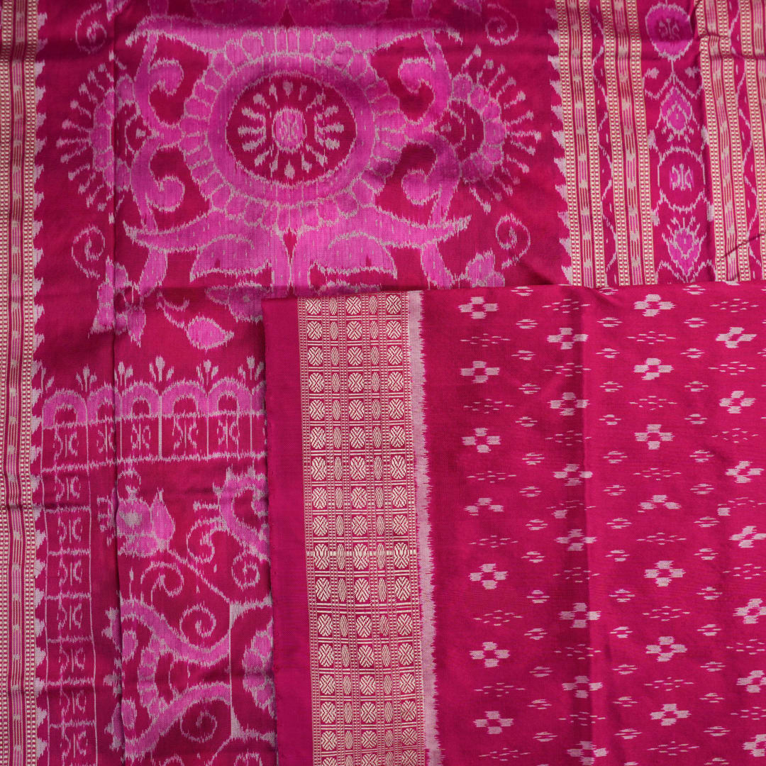 Detail of the luxurious silk texture and exquisite handloom weave of the Multi-color Pink Sambalpuri Saree.