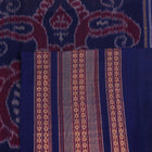 Cream cotton Bomkai saree with blue butta pattern, full view.