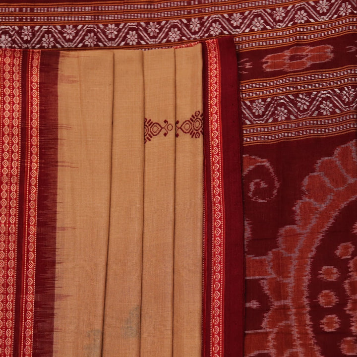 Full view of a traditional brown and maroon Bomkai cotton saree with butta patterns