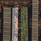 Full layout of green and black Sambalpuri cotton saree showcasing the complete pattern and motifs.