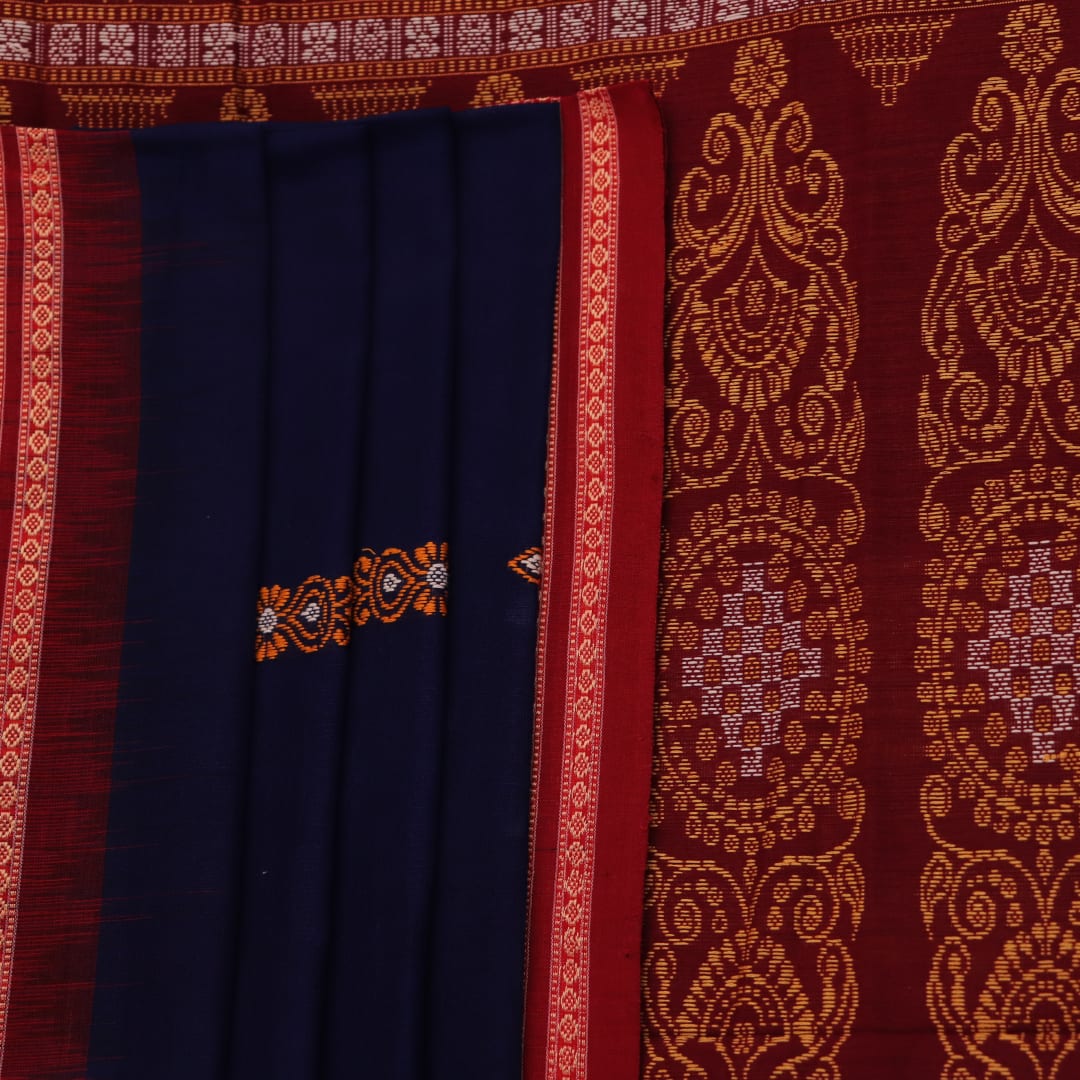 Full view of a blue and maroon Bomkai cotton saree with a butta pattern.