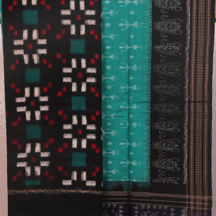 Detail of black cotton Sambalpuri dress material blouse piece with green Pasapalli pattern.