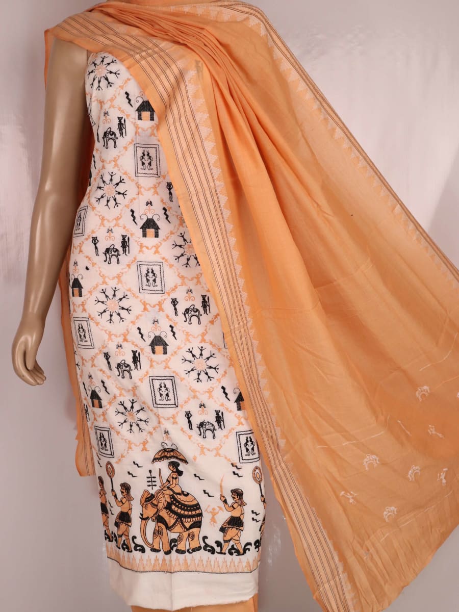 Detail of brown and white cotton Sambalpuri dress material with a doll pattern on a white background