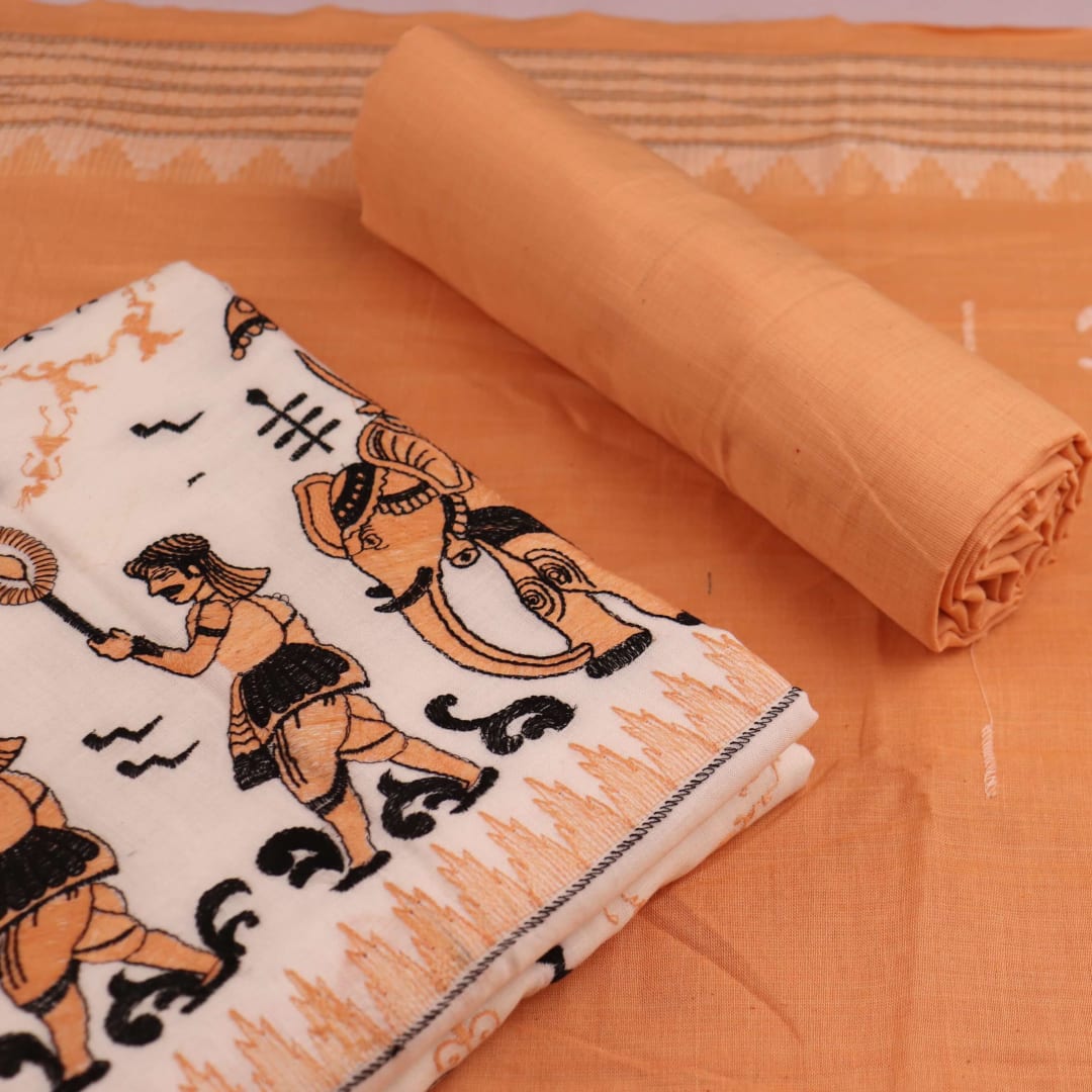 Detail of brown and white cotton Sambalpuri dress material with a doll pattern on a white background