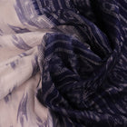 Model wearing a white Sambalpuri cotton saree with blue motifs, showcasing the drape and overall look.