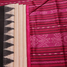 Close-up of plain white and black handloom Tussar Silk saree fabric texture.