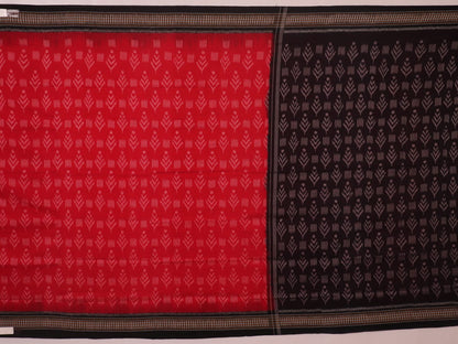 Red and black Sambalpuri cotton saree with motifs, elegantly draped to showcase its style and design.