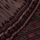 Elegantly draped grey Sambalpuri cotton saree with maroon motifs.