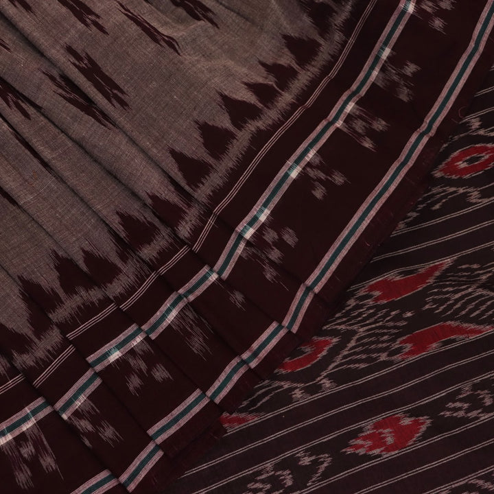 Elegantly draped grey Sambalpuri cotton saree with maroon motifs.