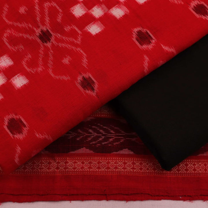 Close-up detail of black Pasapalli pattern on red cotton Sambalpuri dress material blouse piece