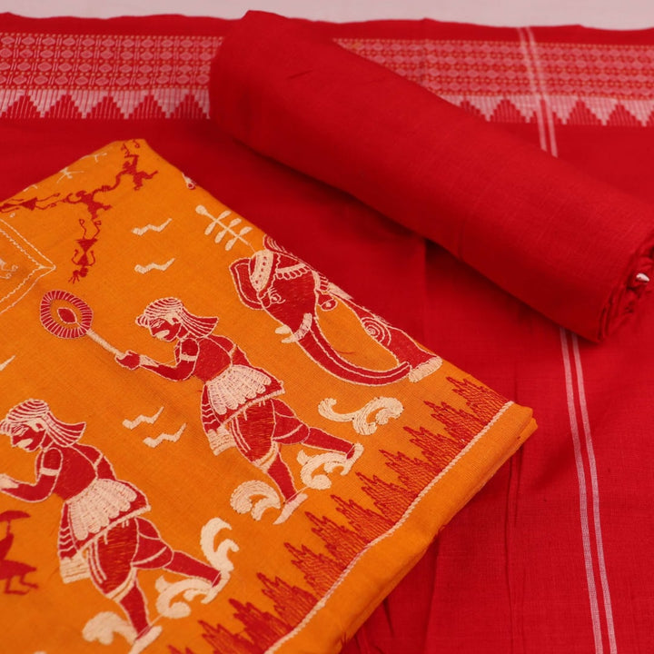 Close-up of Sambalpuri dress material blouse piece in yellow base with red doll motifs