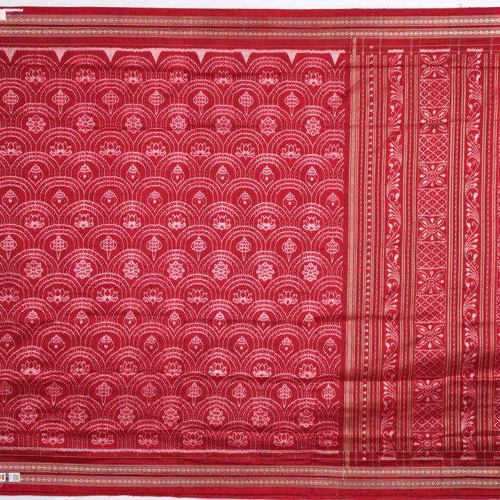 Full view of the maroon Sambalpuri silk saree with traditional motifs, displaying entire length and border.