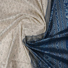 Close-up of premium fabric texture and handloom weave on a white and blue Sambalpuri silk saree