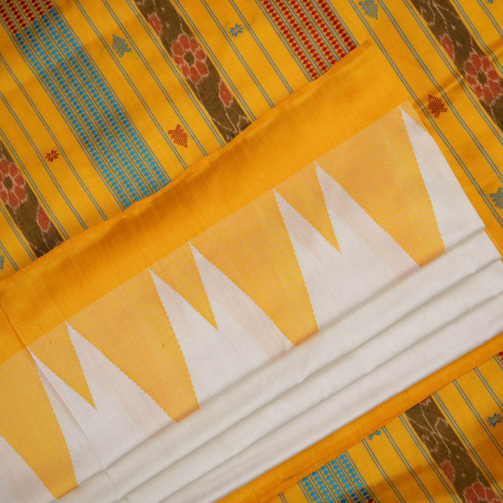 Close-up of the smooth texture and plain weave of white Sambalpuri silk fabric.