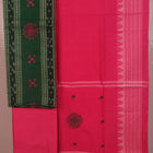 Detail of the blouse piece for a green Sambalpuri cotton dress material with pink motifs.
