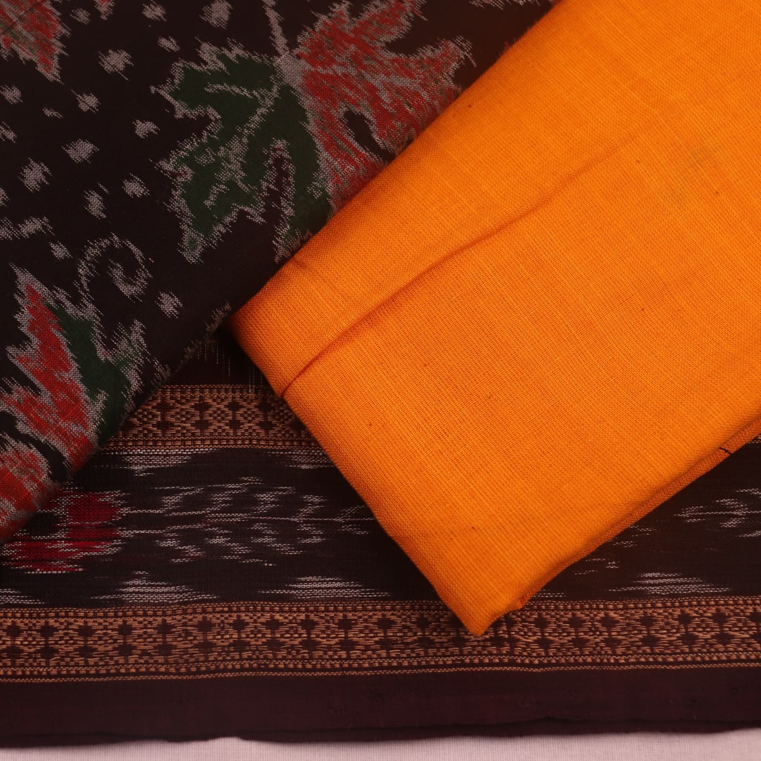 Close-up of the brown and yellow Sambalpuri cotton dress material blouse piece, with motifs.