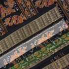 Full layout of green and black Sambalpuri cotton saree showcasing the complete pattern and motifs.